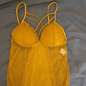 Yellow Lacey bodysuit